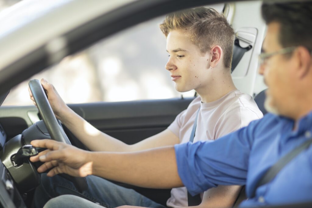Learner driver with instructor in car| Understanding Minimum Age Requirements for a Learners Licence