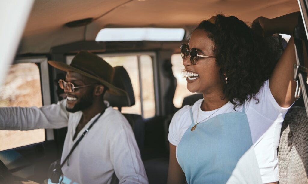Road trip, driving and black couple drive to travel on a summer vacation with a smile. K53 Guidance Signs: Pass Your Learners Licence in South Africa