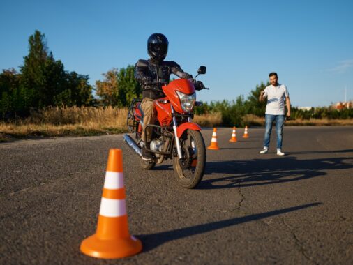 Student and instructor, exam in motorcycle school | Mastering the K53 Motorcycle Test requires a combination of skill, knowledge, and practice.