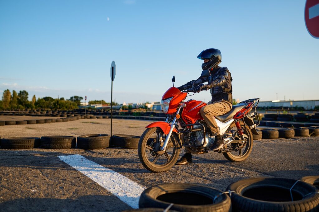 Student on motorbike at starting line, K53 Time Limits for Motorcycle Test: No Rush, but Stay Focused