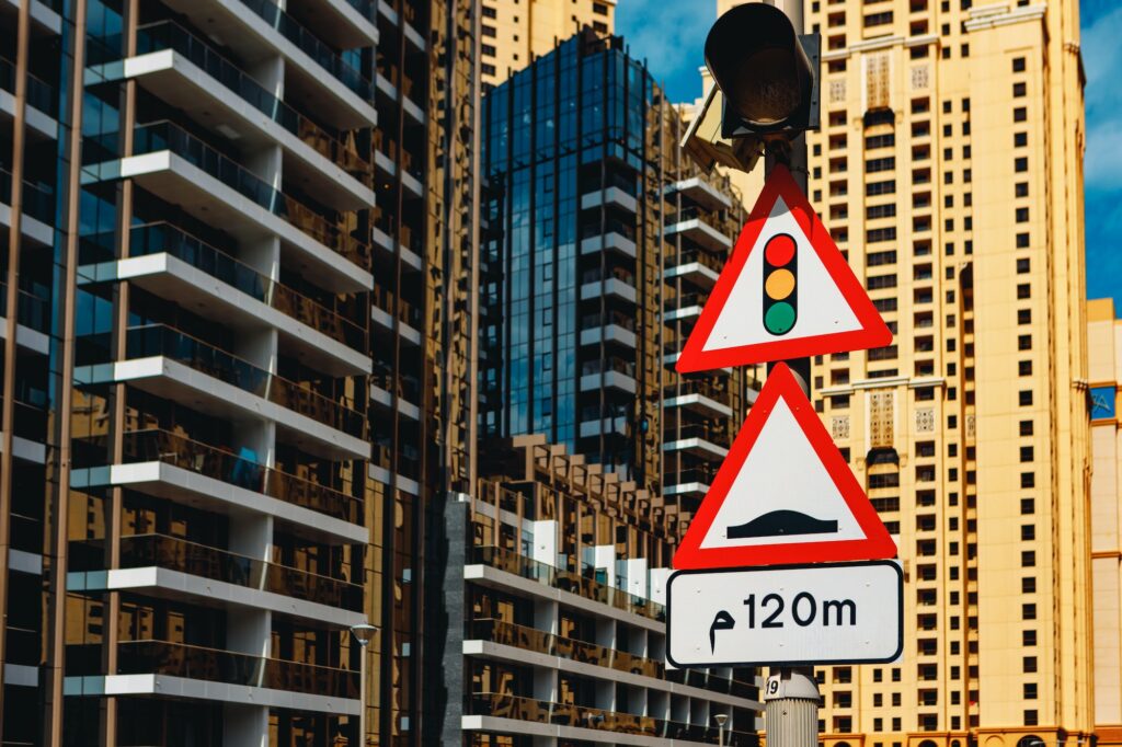 Traffic light and speed bump road sign in Dubai | Stopping Techniques To Pass Your K53 Driving Licence Test!